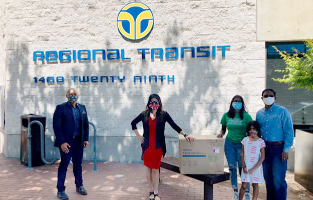 Treasurer Ma and representatives of the Asian Pacific Islander American Public Affairs organization delivering protective masks to the Sacramento Regional Transit District office